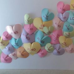 there are many conversation hearts on the wall