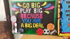 a sign that says go big play big because you are a big deal on the wall