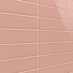 a pink brick wall with white lines on it