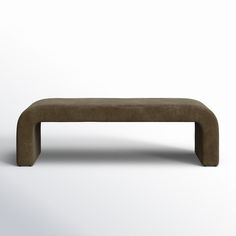 the bench is made out of suede and has an extended foot rest on one end