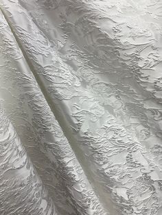 an image of white fabric that looks like it has been made into something interesting pattern