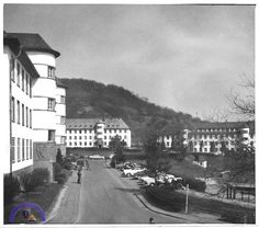 an old black and white photo of a town