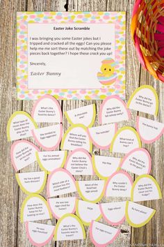 an easter egg scramble game with lots of eggs and paper circles on the table next to it