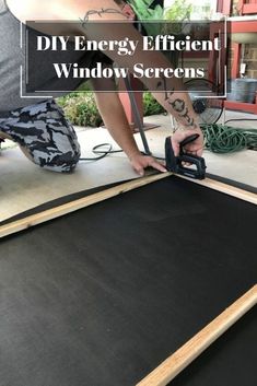 a man working on a window screen with the words diy energy efficient window screens