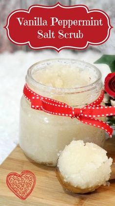 vanilla peppermint salt scrub in a jar on a cutting board with a red ribbon