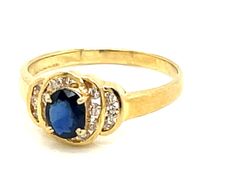 Item Specifications:Metal: 14K Yellow GoldStyle: Statement RingRing Size: 6 (resizing available for a fee)Total Weight: 2.1 GramsRing Height: 7.76 mmGemstone Specifications:Gemstone: 1 blue sapphireShape: ovalSapphire Measurements: ~5.4 mm x 4.3 mm x 2Diamond Count: 16Diamond Carat Weight: ~0.10Diamond Color: H-IDiamond Clarity: SI-I1Condition: NewStamped: "14K" "585" Luxury Everyday Yellow Gold Sapphire Ring, Sapphire And Diamond Ring, Sapphire Diamond Ring, Sapphire Diamond, Gold Style, Timeless Beauty, Blue Sapphire, Statement Rings, Diamond Ring