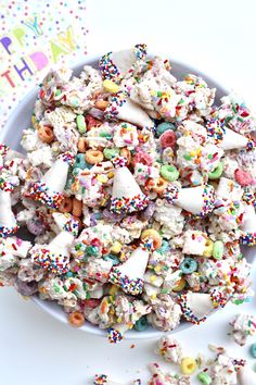 a bowl filled with sprinkles and lots of candy