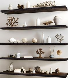 several shelves with various decorative items on them