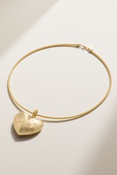 The elegant simplicity of Lauren Rubinski's necklace belies its meticulous artisanship. Handcrafted in her Italian workshop from 14-karat gold, it's adorned with an oversized heart pendant carved with smaller hearts and stars. It looks as stunning worn solo as it does layered with your favorite chains. Luxury Yellow Gold Jewelry With Heart Charm, Heirloom Yellow Gold Heart Necklace, Luxury Yellow Gold Heart Pendant Jewelry, Heirloom Yellow Gold Necklace With Heart Charm, Yellow Gold Sterling Silver Heart Pendant Necklace, Yellow Gold Heart Pendant Jewelry With Engraving, Yellow Gold Engraved Heart Pendant Jewelry, Engraved Yellow Gold Heart Necklace With Round Pendant, Heirloom Yellow Gold Heart Pendant Necklace