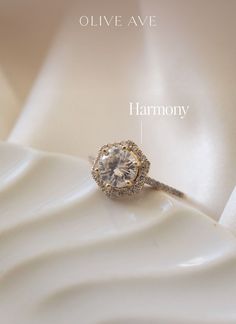 an image of a diamond ring with the words harmony written below it and above it