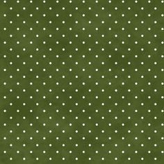 a green background with white polka dots