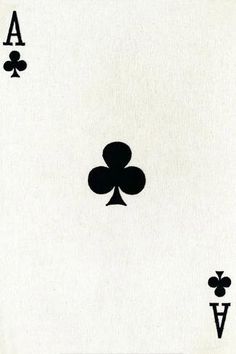 the back side of a playing card with four spades