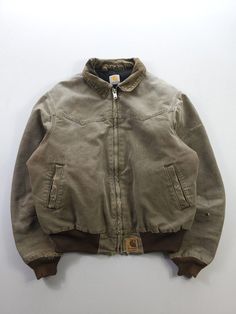 Listing: Vintage Carhartt Santa Fe Canvas Work Jacket Brown Full-Zip Extra Large Regular Size on Tag: N/A Flaws: Distressing and wear throughout Measurements: Please see the photos in the listing. If you require additional measurements or information about this item, feel free to send a message. Wicked Fashion, Worker Jacket, Canvas Work, Work Jackets, Cute Fits, Retro Outfits