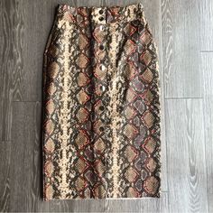 Never Worn Python Snake Print Gold Snap Front, Slip Front Pockets. Brown And Black With Hints Of Orange And Purple. Measurements In Photos. From A Smoke-Free, Pet-Free Home. Python Snake, Python Print, Zara Skirts, Faux Leather Skirt, Orange And Purple, Snake Print, Python, Leather Skirt, Black And Brown