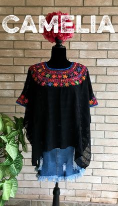 Guatemalan hand loomed and silk embroidered cover up. Perfect to use at the beach, pool or for daily wear over a tank top. Open sides and embroidery detail around neck and arms. Silk embroidery and cotton loomed thread. Made of 3 pieces of loomed fabric which are connected with thread. SIZE CHART: GUATEMALAN HUIPIL COVER UP WIDTH LENGTH ONE SIZE 37" 25" approximate measurements are in inches CARE:• Hand wash in cold water. • Lay flat to dry.• Do not iron. Please contact us if item is out of stoc Peasant Style Embroidered Top For Beach, Bohemian Embroidered Festival Poncho, Folk Embroidered Beach Blouse, Embroidered Folk Blouse For Beach, Folk Style Embroidered Beach Blouse, Bohemian Tops With Geometric Embroidery For Vacation, Floral Embroidered Tunic Top For Festival, Peasant Floral Embroidered Top For Beach, Bohemian Blouse With Woven Motifs For Festivals