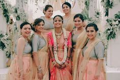 a group of women standing next to each other