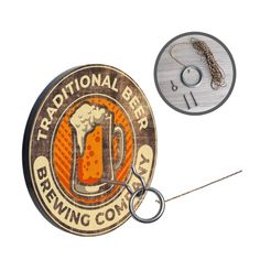 a beer bottle opener with a keychain attached to it and a button that says traditional beer brewing company