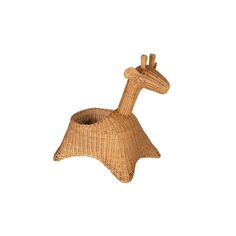 a giraffe shaped wicker basket on a white background