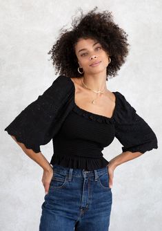 [Color: Black] A model wearing a cropped black bohemian top with a smocked bodice Bohemian Top, Feminine Chic, Bohemian Tops, Eyelet Top, Tops Black, Cropped Top, Boho Tops, Affordable Fashion, Square Neckline