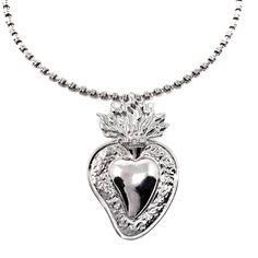 Based on a DelBrenna family design, our Flaming Heart pendant represents our passion for our craft. We love beauty, fashion, and sharing our creativity with you. This pendant calls you to open your heart and share your wonderful self with the world! Pendant in 925 silver with DelBrenna’s Signature Rhodium Finish. It is 2 1/4” in height and 1 1/2” wide. Its bail slides onto all DelBrenna chains up to 5mm. Chain sold separately. Silver Spiritual Heart Charm Necklace, Valentine's Day Heart Pendant Necklace With Sterling Silver Clasp, Sterling Silver Heart Beads Pendant Necklace, Sterling Silver Heart Pendant Jewelry Gift, Spiritual Sterling Silver Heart Charm Necklace, Sterling Silver Jewelry With Heart Beads, White Gold Heart Necklaces With Sterling Silver Clasp, White Gold Heart-shaped Jewelry With Sterling Silver Clasp, Silver Heart Jewelry With Large Pendant