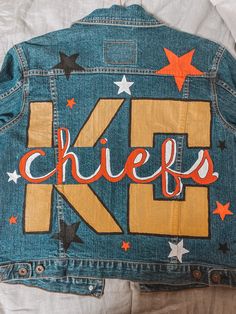 Sports Team Jean Jacket Diy, Painted Jean Jacket Lsu, Painted Denim Jacket Football, Painted College Jean Jacket, Nfl Jean Jacket Diy, Painted Denim Jacket School Spirit, College Jean Jacket Diy, Jean Jacket Painted Football, College Denim Jacket