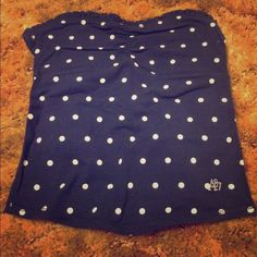 Aeropostale belly shirt Navy blue with white dots belly shirt. Brand new never been worn, without tags. Has tie able straps in back that allows some of your back to be revealed Aeropostale Tops Crop Tops Cute Polka Dot Sleeveless Top, Stretch Polka Dot Summer Tops, Summer Stretch Polka Dot Tops, Stretch Polka Dot Tops For Summer, Fitted Polka Dot Cute Tops, Cute Fitted Polka Dot Tops, Fitted Cute Polka Dot Tops, Polka Dot Sleeveless Cotton Top, Sleeveless Polka Dot Cotton Tops