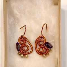 Handmade In My Jewelry Studio Butterfly Wing Copper Wire Earrings With Amethyst Stones And Sterling Bead Adornment. Item Is New Never Worn. All Stones Are Natural. Natural Copper Wire Which Will Patina Overtime. Artisan Purple Earrings With Ear Wire, Purple Artisan Earrings With Ear Wire, Purple Wire Wrapped Beaded Earrings For Gift, Artisan Hand Wrapped Earrings As Gift, Artisan Hand Wrapped Earrings For Gift, Purple Bohemian Crystal Earrings As A Gift, Purple Bohemian Crystal Earrings For Gift, Handmade Amethyst Crystal Earrings As Gift, Handmade Amethyst Crystal Earrings For Gift