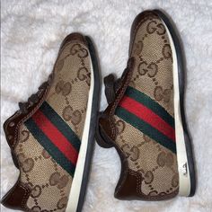 Gently Used 100% Authentic Kids Gucci Sneakers Sporty Brown Flat Sneakers, Gucci Casual Slip-on Sneakers, Brown Gucci Designer Sneakers, Designer Brown Gucci Sneakers, Casual Gucci Sneakers With Leather Sole, Brown Gucci Sneakers For Streetwear, Designer Brown Sneakers With Round Toe, Designer Brown Round Toe Sneakers, Designer Brown Slip-on Sneakers