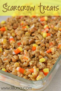 a glass dish filled with rice and candy corn