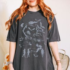 Halloween Comfort Colors® Unisex T-shirt, Retro 90's Grunge Aesthetic Shirt, Dark Art Grunge Punk Tee, Grunge Punk Aesthetic Clothing COMFORT COLORS 1717 UNISEX T-SHIRT ✨ SIZE GUIDELINES ✨ - This shirt fits true to size - If you want a comfortably fitted look, I recommend sticking with your regular t-shirt size - If you want a slightly oversized fit, I recommend sizing up one size - If you want a true oversized fit, I recommend sizing up two to three sizes ✨ You can contact me for more color, si Halloween Graffiti Print Short Sleeve Tops, Halloween Graffiti Print Crew Neck Top, Halloween Graffiti Print Crew Neck T-shirt, Halloween Anime Print Crew Neck T-shirt, Graffiti Print Top For Halloween Concert, Graffiti Print Tops For Halloween Concert, Fairy Grunge Crew Neck T-shirt With Graphic Print, Graffiti Print T-shirt For Alternative Fashion, Graffiti Print Short Sleeve T-shirt For Alternative Fashion