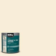 the behr paint is light beige and has a brown base with white lettering on it