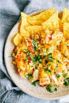 nachos and chips on a white plate