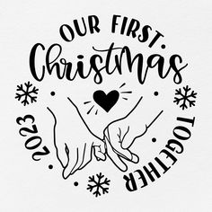 two hands are holding each other with the words our first christmas written in black ink