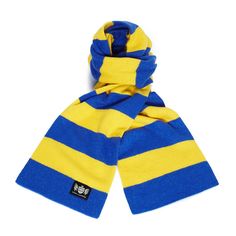 a blue and yellow striped scarf with a black patch on the bottom that says,