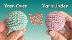 two hands holding small crocheted balls, one pink and the other light blue