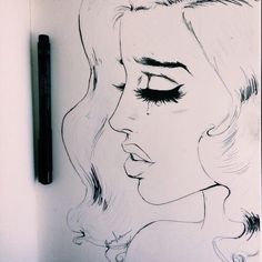 a drawing of a woman's face with long hair and eyeliners on it