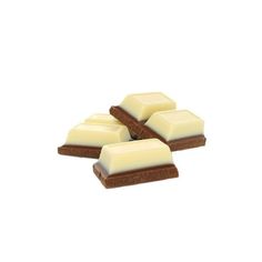 four pieces of white chocolate sitting on top of each other