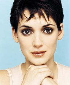 a close up of a person with short hair