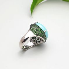 🌱Handmade 14K Turquoise ( 2.83 gram ) ring 🌱14K 585 gold and Natural Tsavorite (110 pcs) 🌱Authentic Korean jewelry 🌱Free standard shipping from Seoul, Korea with tracking 🌱Will take approximately 7-21 days to arrive, worldwide NASCHENKA is an artistic expression of Korean culture and history through traditional jewelry. We use natural and authentic stones. Each piece is thoughtfully designed by a designer and handmade by a highly skilled master artisan. Size Guide * The approximate size and Turquoise Fine Jewelry Ring, Exquisite Green Emerald Sterling Silver Ring, Handmade Luxury Emerald Ring, Elegant Turquoise Ring Gift, Luxury Silver Turquoise Ring With Gemstone, Exquisite Green Ring Jewelry, Luxury Oval Turquoise Ring For Gift, Luxury Oval Turquoise Ring Gift, Luxury Turquoise Ring As A Gift