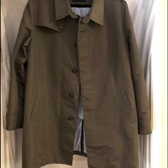 Tommy Hilfiger Mens Water-Resistant Trench Coat. Size 42r.. Its Nwot. Size 42r And Brown In Color. It’s Fully Lined With The Classic Th Print. It’s Button-Up With Buttons On The Sleeves. Rn # 47338. 100% Polyester. Sleek On Feel. Approx Measurements Shoulder To Shoulder 19” Length 40-42 Sleeves 25” If You Have Any Questions Or Require Additional Photos/Measurements, Please Just Let Me Know. Thanks For Looking. Tommy Hilfiger Jackets, Tommy Hilfiger Man, Trench Coats, Trench Coat, Mens Jackets, Tommy Hilfiger, Button Up, Water Resistant, Jackets & Coats