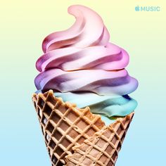 an ice cream cone with multicolored swirls on it's top, against a pastel blue background