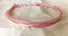 Super cute Pura Vida style waxed string stackable bracelets. Lots of colors available (see photos). Please see photos for bracelet examples and note your color number(s) in the Personalization box. Feel free to send me a message &/or picture if you would like to design your own! 😊 Thank you!! ❤️ 🌴 🌞 🌺 🌊 ️ 🏝 ⛱ 👙 🐠 Adjustable Pink Stackable Friendship Bracelets, Adjustable Stackable Pink Friendship Bracelets, Adjustable Cute Bangle Friendship Bracelets, Cute Adjustable Bangle Friendship Bracelets, Casual Pink Stackable Friendship Bracelets, Casual Pink Stackable Jewelry, Basic Bracelet, Surfer Bracelets, Bracelet Friendship