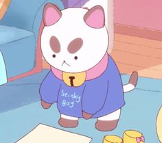 a cartoon cat wearing a blue shirt standing in front of a pile of papers and toys