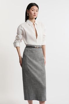 Experience Updated Tailoring Essentials With Our Midi Skirt, With A Fitted Silhouette And A High Waistline, Creating A Universally Flattering Fit. The Monochrome Colouring And Textured Fabric Adds Dimension And Unique Detail To The Look, And This Piece Can Easily Be Paired With A Crop Top For A Day To Night Look, Then With The Matching Jacket For A Co-Ordinating Occasion Look. Mono Textured Pencil Skirt​ High Quality, Textured Fabric Classic, Monochrome Fabric Comfortable High Waistline Flatteri Classic Skirts Outfits, Business Casual Midi Skirt, Midi Pencil Skirt Outfit For Work, Midi Skirt Outfit Office, Body Shape Outfits Rectangle, Outfits Rectangle Body Shape, Office Outfits Skirt, Pencil Skirt Outfits Classy, Midi Pencil Skirt Outfit