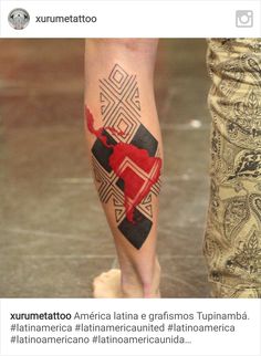 a person with a tattoo on their leg