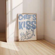 a sign that says chef's kios on it in front of a wooden floor