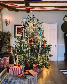 a decorated christmas tree in a living room