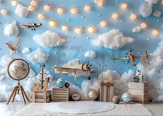 an airplane themed bedroom with clouds and lights