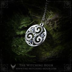 This triskel pendant, celtic symbol of earth, water and fire, is adorned with blue swarovski crystals. - High quality pewter, 97% pure and hypoallergenic - Totally hanmade - Authentic swarovski crystals - Sold without chain, choose your stainless steel chain 46 cm / 17" or 60 cm / 24" (hypoallergenic) - Size of the pendant: 3,1 x 2,9 cm We only use high quality pewter to create the jewelry of our brand. This pewter is pure at 97% and in accordance with European standards (lead, nickel, cadmium a Ruby Red Necklace, Esoteric Jewelry, Triquetra Necklace, Triquetra Pendant, Water And Fire, Celtic Symbol, Pentagram Pendant, Celtic Pendant, Howlite Stone