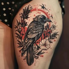 a black bird sitting on the side of a woman's thigh with flowers and birds around it